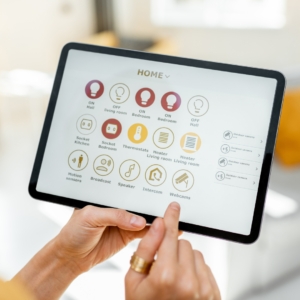 Person using a touchpad for a smart home power system.