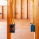 Interior of a home under construction with electrical boxes and wiring.