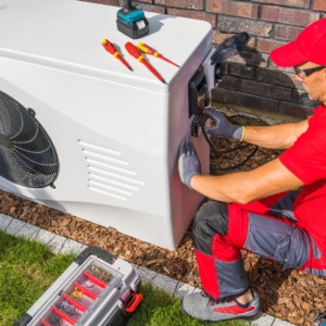 Man installing an HVAC system.