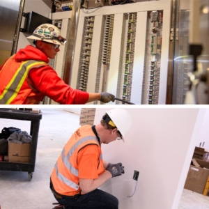 Two young, male commercial electricians fix wiring in walls.
