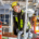Industrial electrical contractor wearing a yellow hard hat and safety glasses, installing conduit in a building under construction.