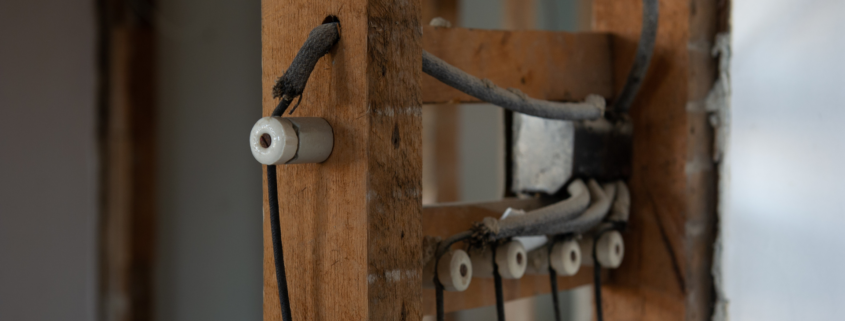 Close-up image of know-and-tube wiring.